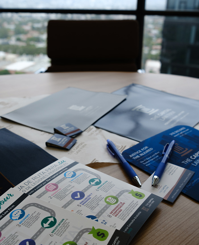 Self-Driving Car Accidents brochures on a desk