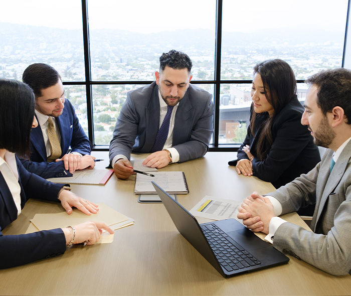 Self-Driving Car Accidents group meeting in the boardroom