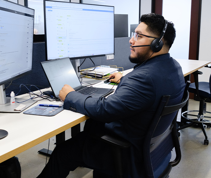 Spinal Cord Injury man at his desk